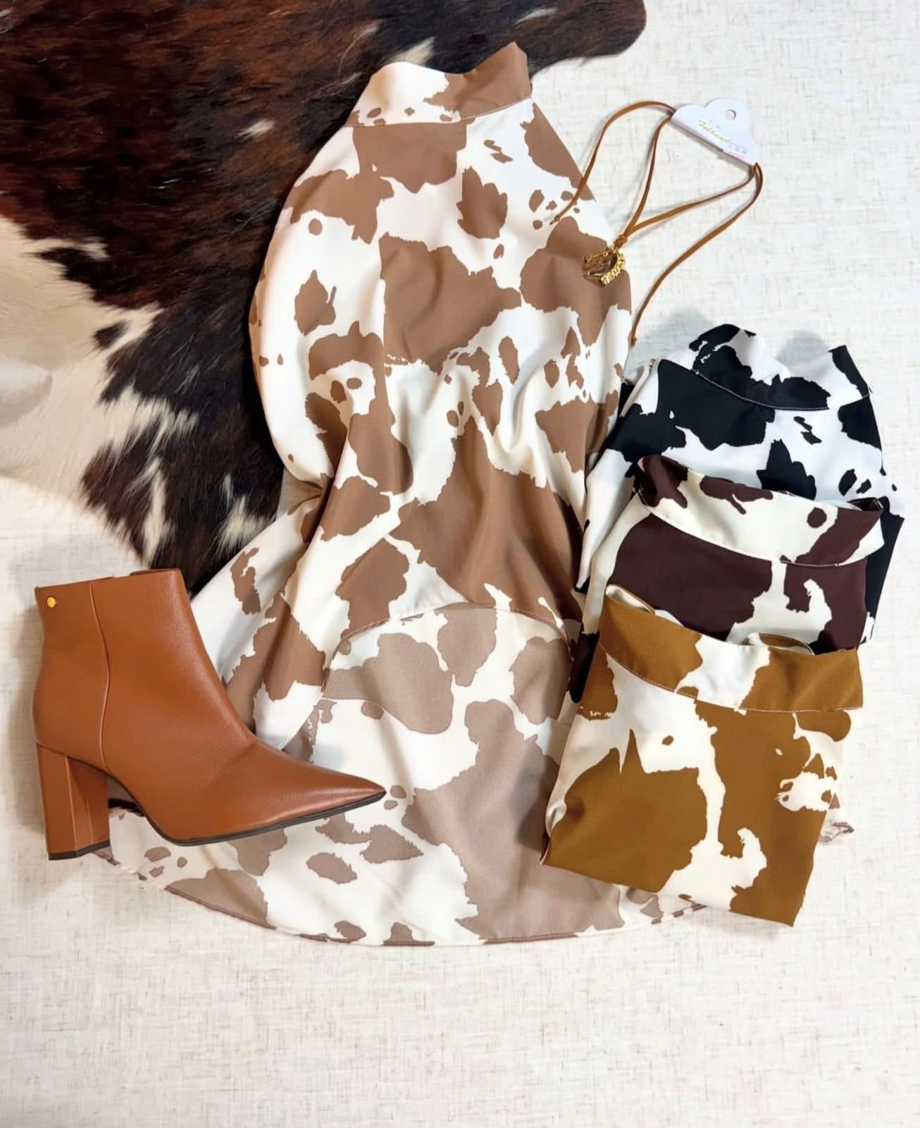 Bata Assimétrica Cow Print